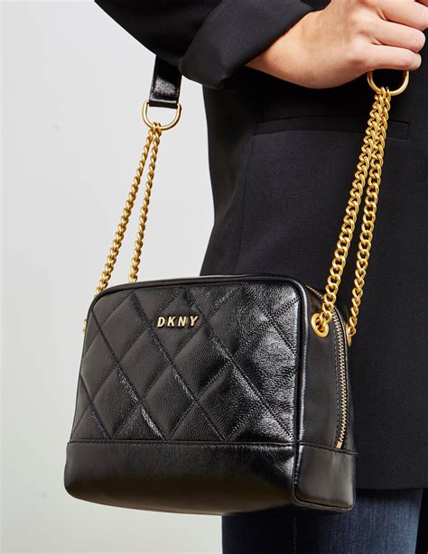 Free Shipping & Returns available. . Dkny black handbag